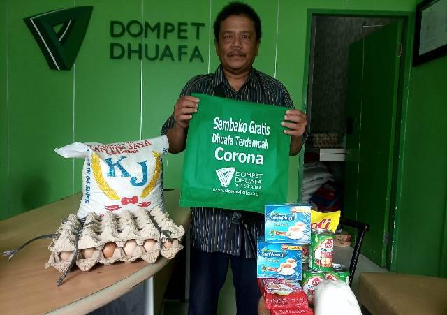 DD Waspada Salurkan Paket Sembako ke Warga Terpapar Covid-19