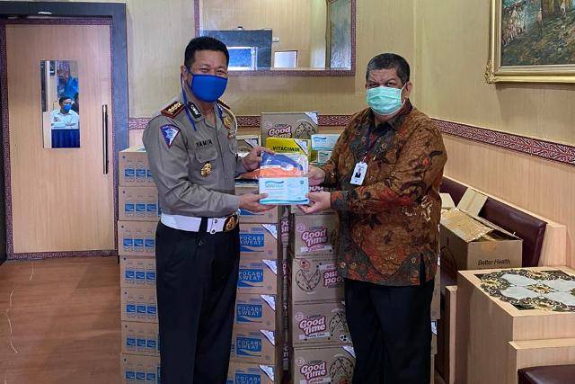 Bank Sumut Bantu Masker dan Vitamin Polisi di Pos PAM & Check Point
