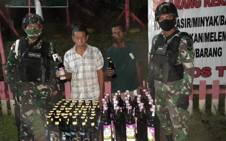 Anggota TNI Amankan Puluhan Botol Miras di Perbatasan Papuanugini