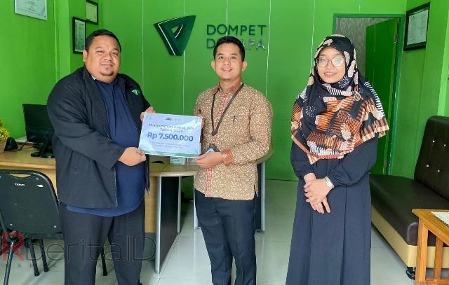 JNE Medan Serah Terima Dana Zakat ke DDW Tahun 2023