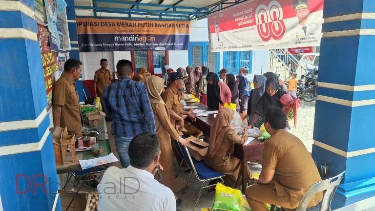 Bazar Pangan Murah dan Layanan Kesehatan Gratis Warga Desa Bandar Setia